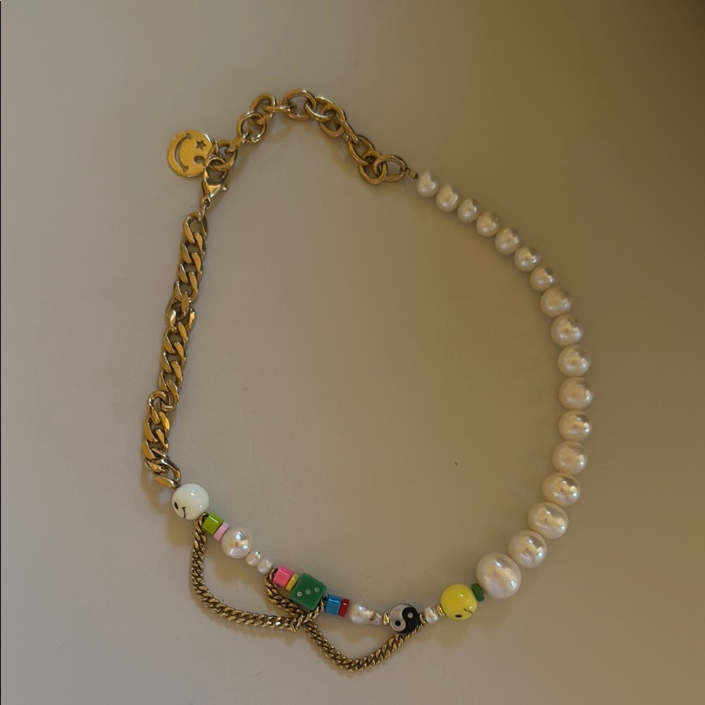 Gold and White Elegant Necklace with Dainty Design